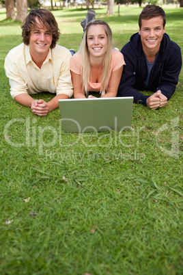 Three smiling students