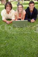 Three smiling students