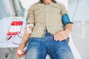 Male patient receiving a blood transfusion
