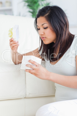 Woman looking in a gift box