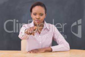Strict teacher pointing of  finger