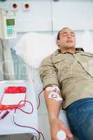 Male patient receiving a transfusion