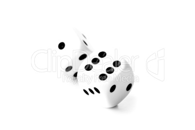 Black and white dices in motion