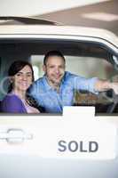 Couple in a sold car