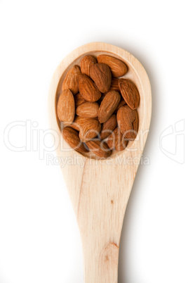 Wooden spoon with almonds