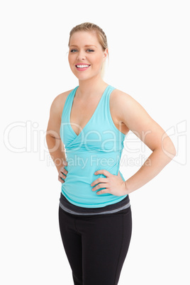 Woman standing while wearing sportswear