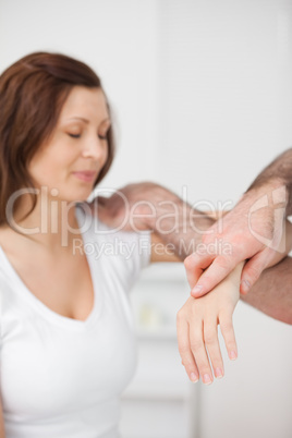 Peaceful patient being examined by a doctor