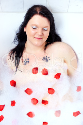 Young woman in wellness in the bathtub