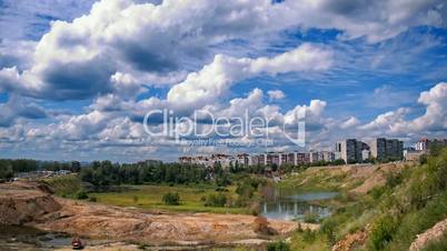 clouds and houses on precipice