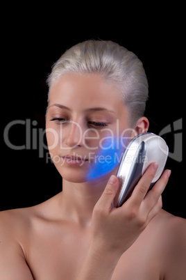 Young woman getting photo-therapy treatment