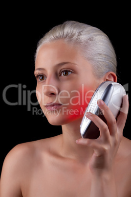 Young woman getting photo-therapy treatment