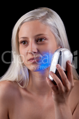 Young woman getting photo-therapy treatment
