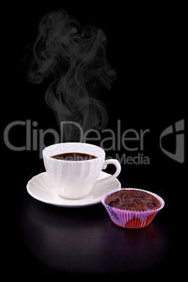 Hot cup of coffee and chocolate cherry muffin