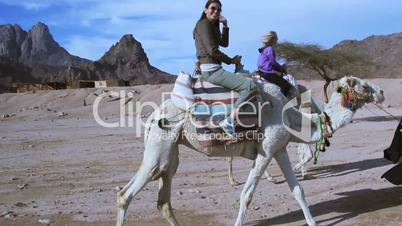 Tourist riding a camel