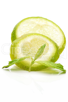 Slices of lime with a branch mint