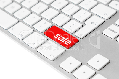 Computer keyboard with red sale button