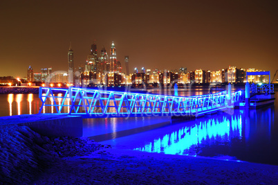 Night illumination of the luxury hotel on Palm Jumeirah man-made