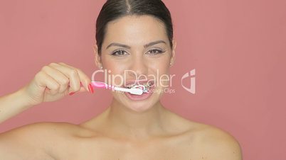 Beautiful woman with toothbrush