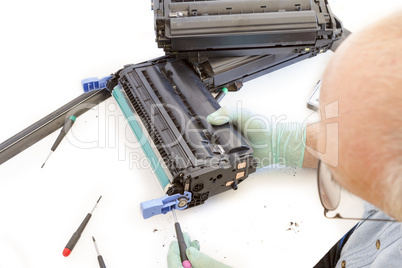 adult man working toner cartridge