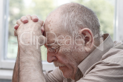 Old man praying