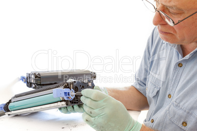adult man working toner cartridge