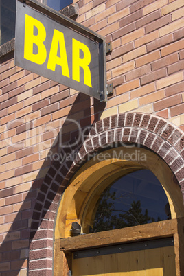 Bar sign door