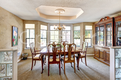 Elegant dining room with antique furniture.