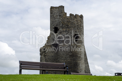 Empty Park Bench with Castle ruin in Background