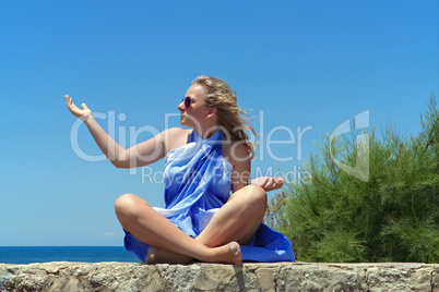 Young girl on sea background