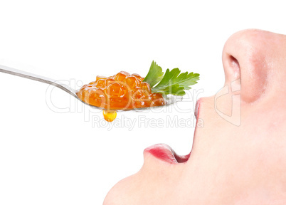 Woman eating caviar. Isolate on white background.