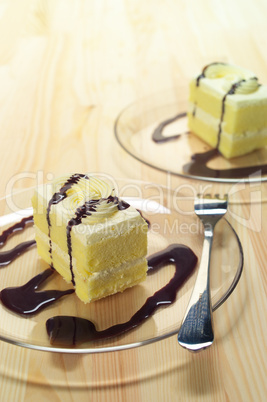 fresh cream cake closeup with chocolate sauce