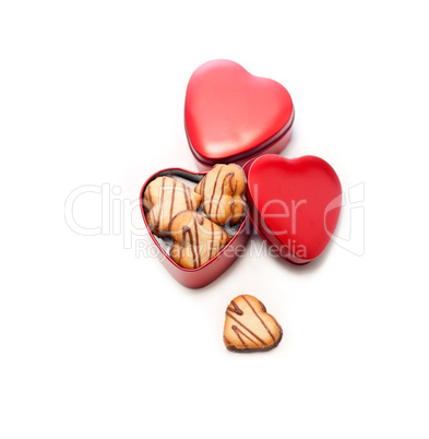 heart shaped cream cookies on red heart metal box