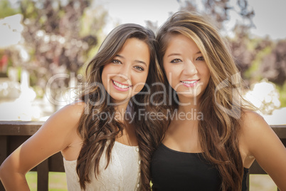 Attractive Mixed Race Girlfriends Smile Outdoors