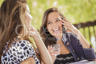 Mixed Race Girls Talking on Thier Mobile Cell Phones