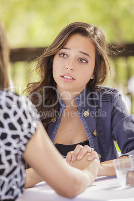 Attractive Girl Comforting A Friend