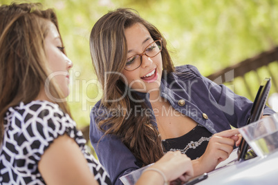 Mixed Race Girls Working Together on Tablet Computer