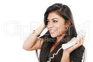 Frustrated businesswoman talking on phone against a white backgr
