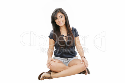 young girl sitting on a floor