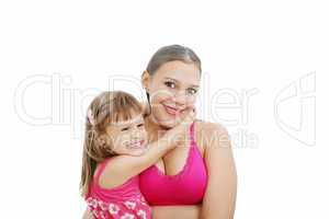 Portrait of Hispanic pregnant woman with daughter isolated over