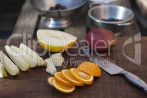 Orange, melon and mango preparation for fruit salad