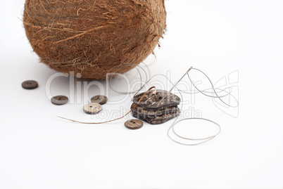 A Coconut and  Buttons handcrafted from Coconut Shell.
