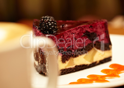 Cheesecake with blackberry on a plate