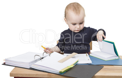 young child at writing desk