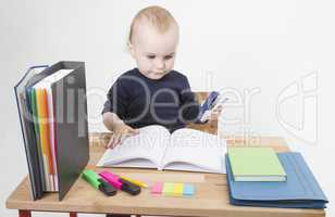 young child at writing desk