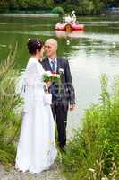 Bridal couple at the lake
