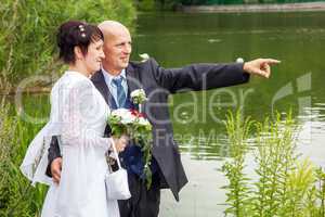 Groom shows with finger