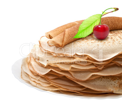 Pancakes with cherries on a white background