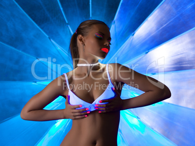 Sexy woman in disco dance with ultraviolet make-up