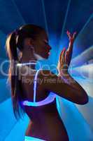 Beauty woman in dance with ultraviolet make-up