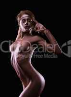 Beauty athletic woman posing nude with metal skin